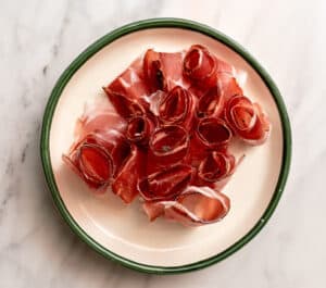 slices of speck with flowers